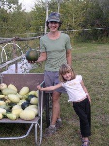 Georgie with daughter Gigi during winter squash harvest in 2009 